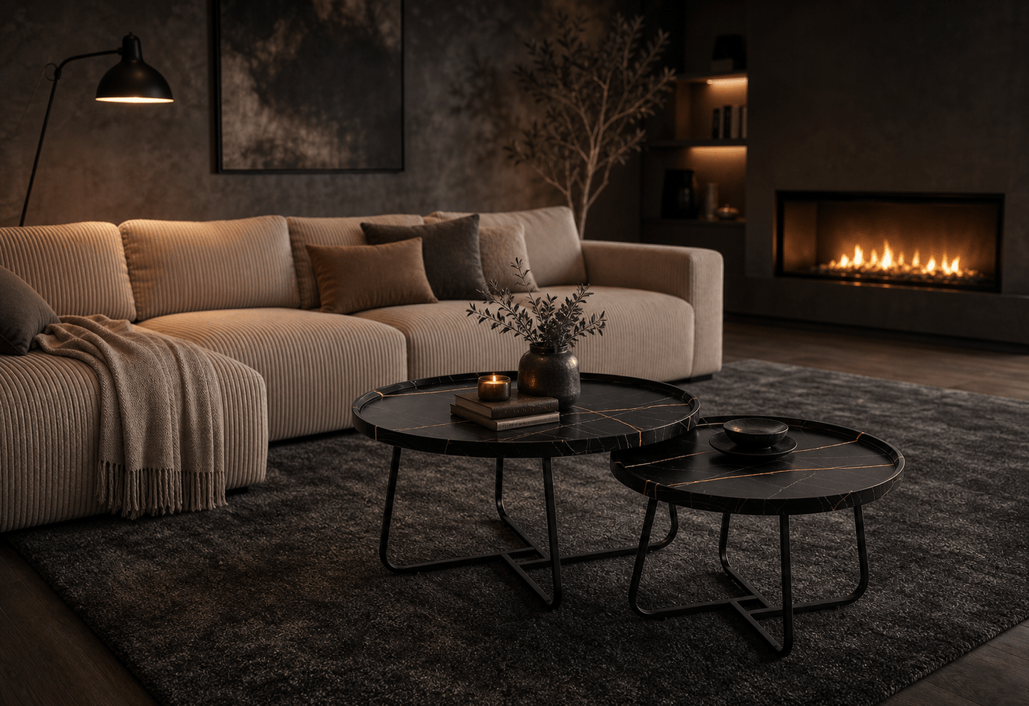 A modern living room scene with a large cream ribbed sectional sofa, dark nesting round coffee tables, a dark textured area rug, a black floor lamp, and a lit fireplace in the background.