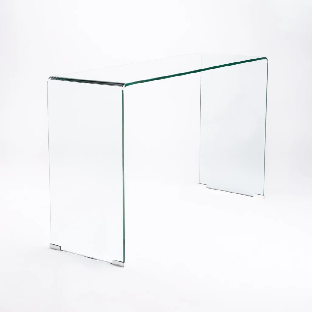 Clear glass side table on a white background