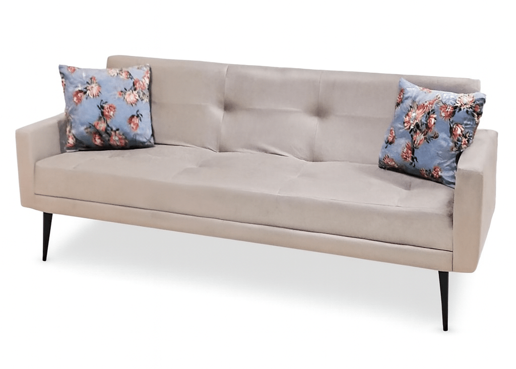 Beige sofa with floral cushions on a white background That Couch Place
