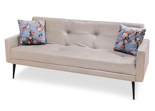 Beige sofa with floral cushions on a white background That Couch Place