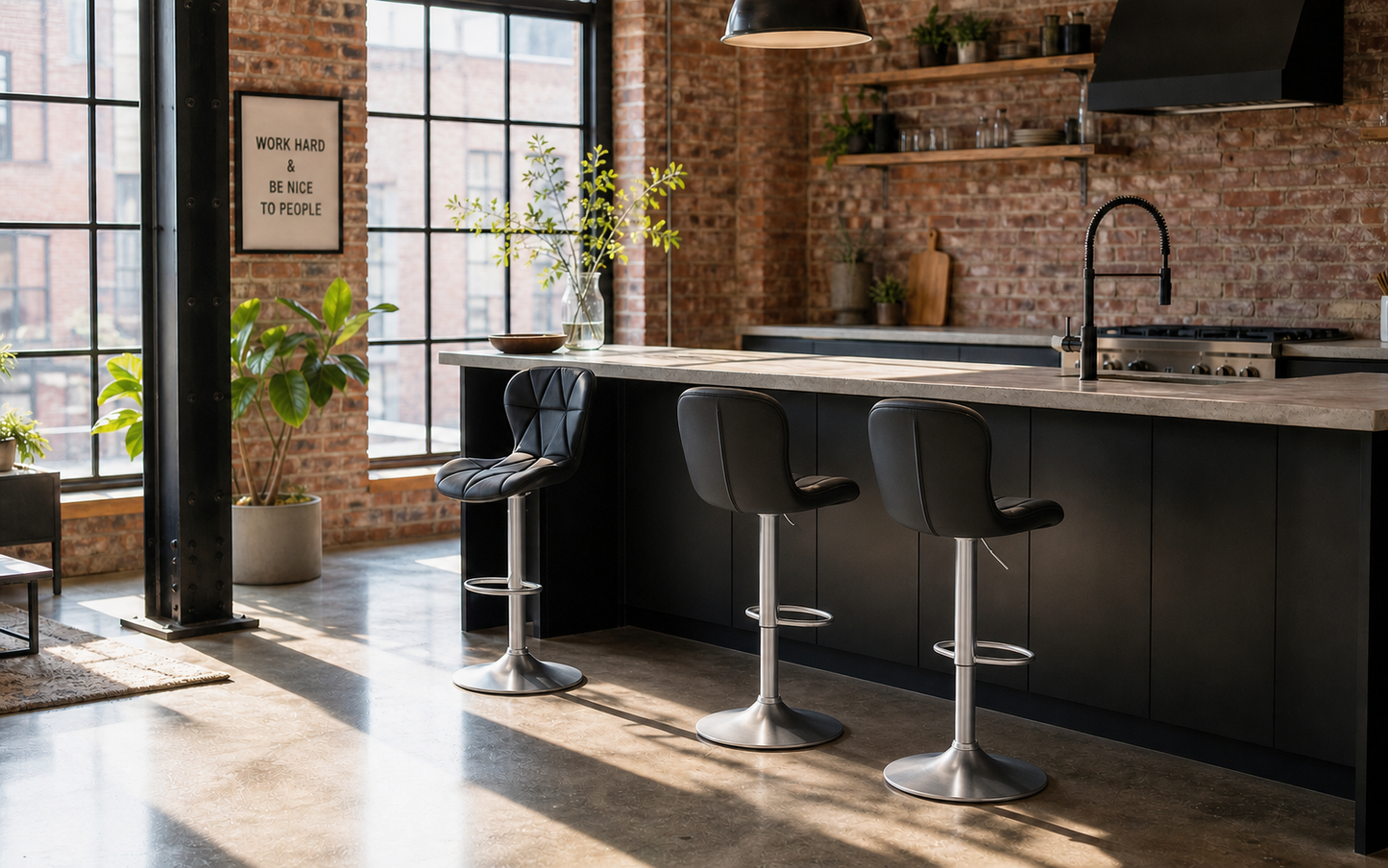 Black Bar Chair with silver chrome legs in a modern Kitchen with black cupboards and marble countertop with concrete floors
