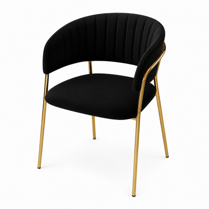 A modern accent chair featuring a black velvet upholstered seat and curved backrest with vertical channel tufting, supported by a polished gold-finished metal frame on a white background.
