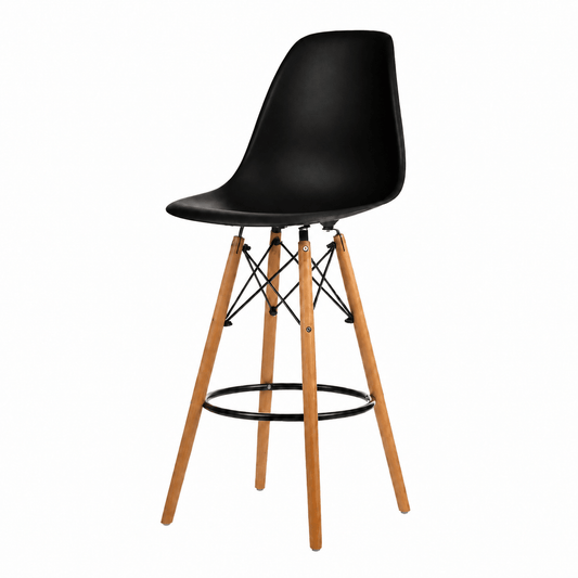A modern counter stool with a molded black plastic seat and four natural wood legs, featuring a black metal footrest ring and wire support structure.