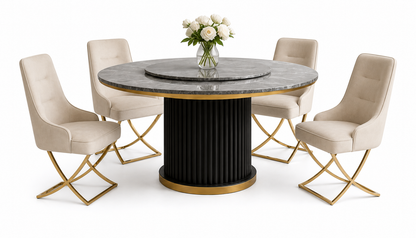 A round dining table set with a gray marble top, black fluted pedestal base, and gold trim, surrounded by four beige upholstered chairs with gold metal legs, on a white background.