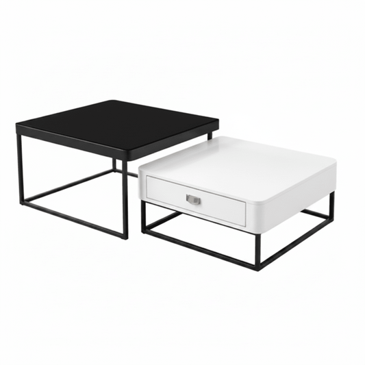 Two modern nesting side tables with black metal frames, one with a black top and the other with a white top and a single drawer, shown on a white background.