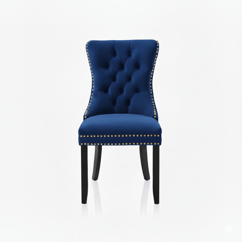 Blue upholstered chair with gold studs on a white background