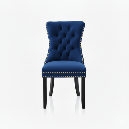 Blue upholstered chair with gold studs on a white background
