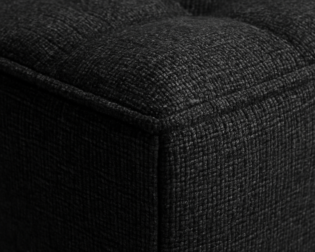Close-up of a dark gray, Charcoal That Couch Place