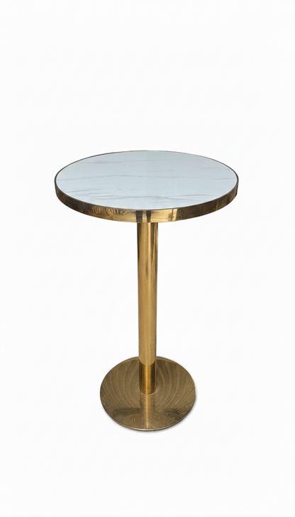 Round bar table with gold base and white marble top on a white background That Couch place