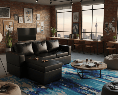 Modern student res room with black sectional sofa, coffee table, and large windows overlooking a cityscape. That couch place