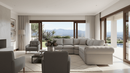 Modern living room with a sectional sofa corner couch , chairs, and large windows overlooking a scenic view.  That Couch Place