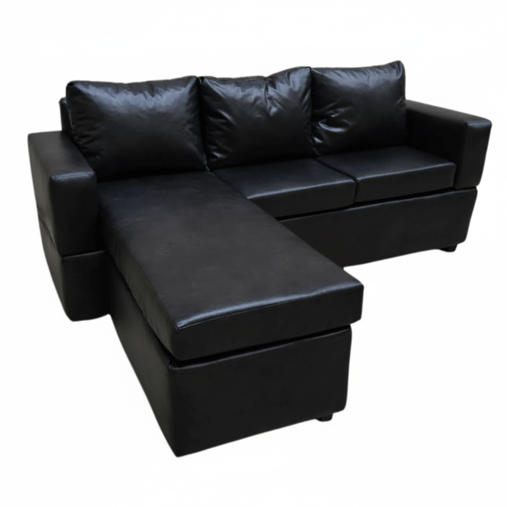 Black leather corner couch on a white background -  That Couch Place