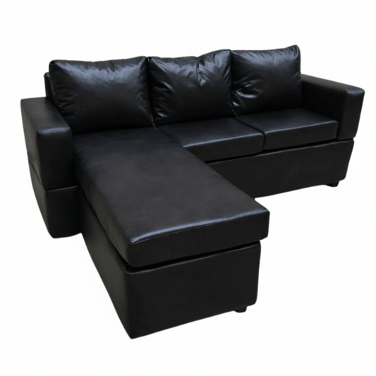 Black leather corner couch on a white background -  That Couch Place