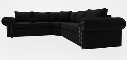 Black sectional sofa on a white background That Couch Place