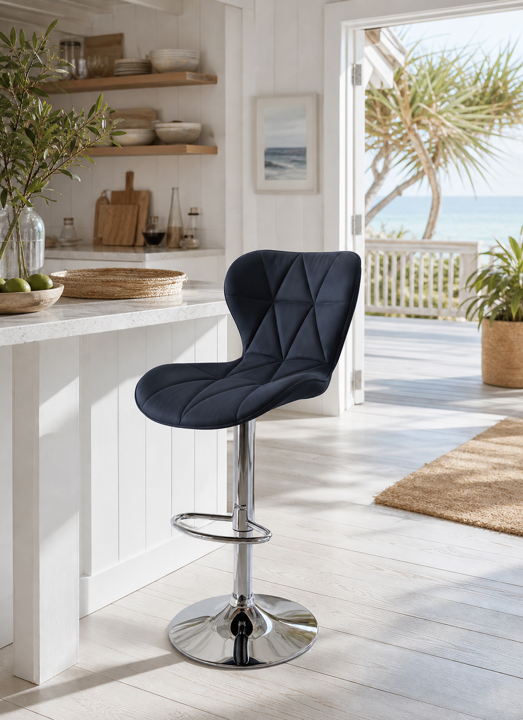 Dark Blue Bar Chair with silver chrome legs in Kitchen with white cupboards and white marble countertop in a seaside apartment