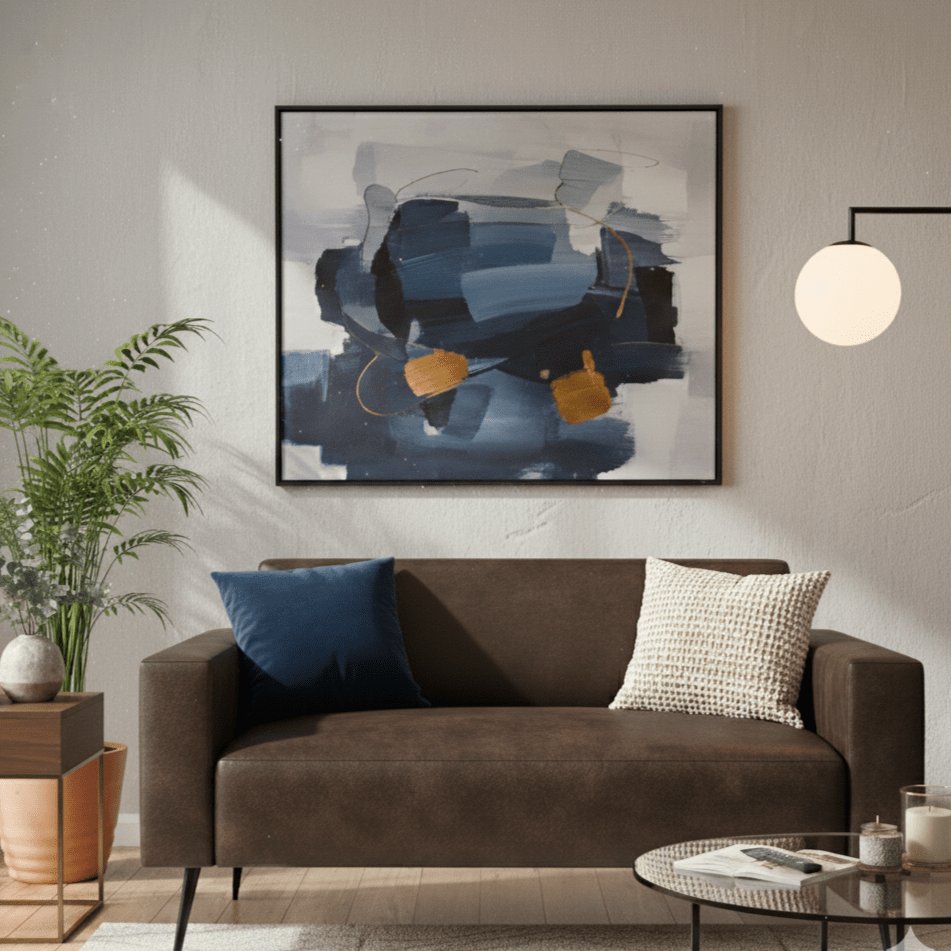 Modern living room with a brown sofa, abstract art, and decorative items.