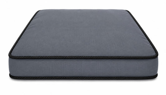 Gray dog mattress on a white background