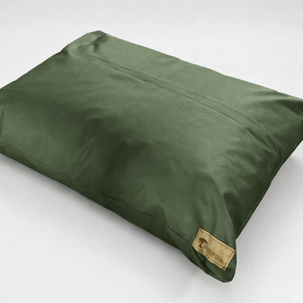 Greendog  pillow with a brand label on a white background