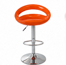 An orange molded plastic barstool with a chrome adjustable pedestal base and footrest, shown against a plain white background.