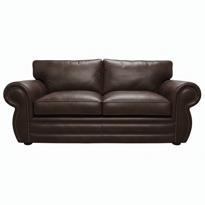 Brown leather soft puffy seating sofa on a white background That Couch Place