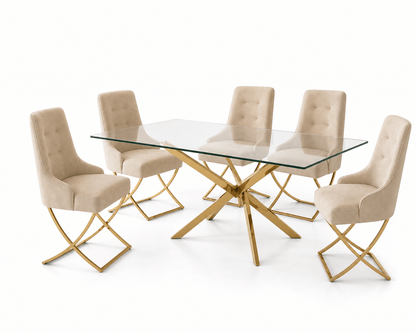 Gold and glass dining table and cream chairs on a white background