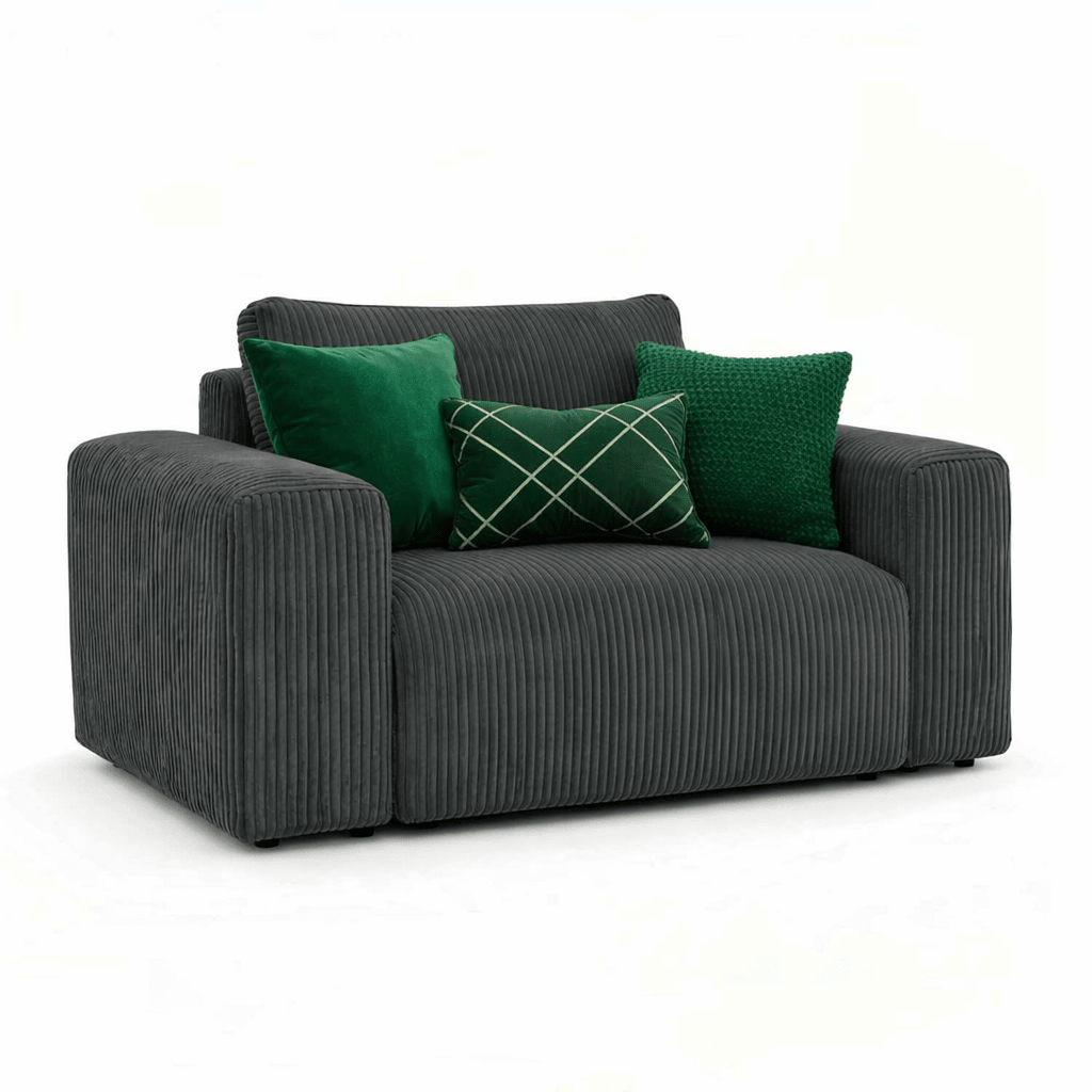 Gray sofa with green cushions on a white background