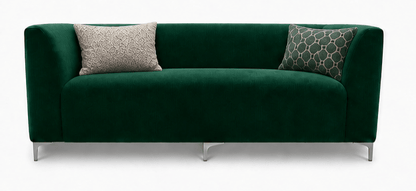 Green sofa with patterned cushions on a white background