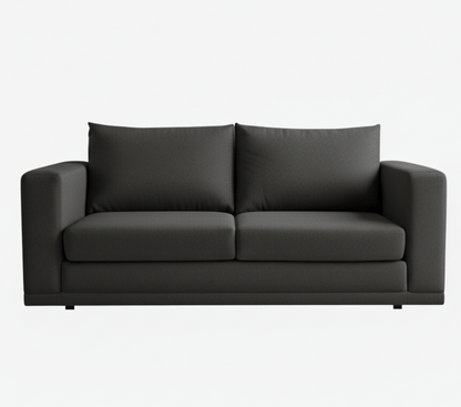 Black sofa on a white background That Couch Place