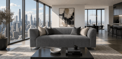 Modern living room with a city skyline view from large windows.