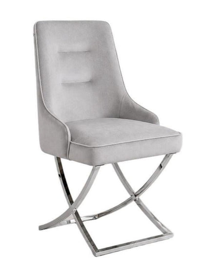 Gray upholstered chair with a metal frame on a white background