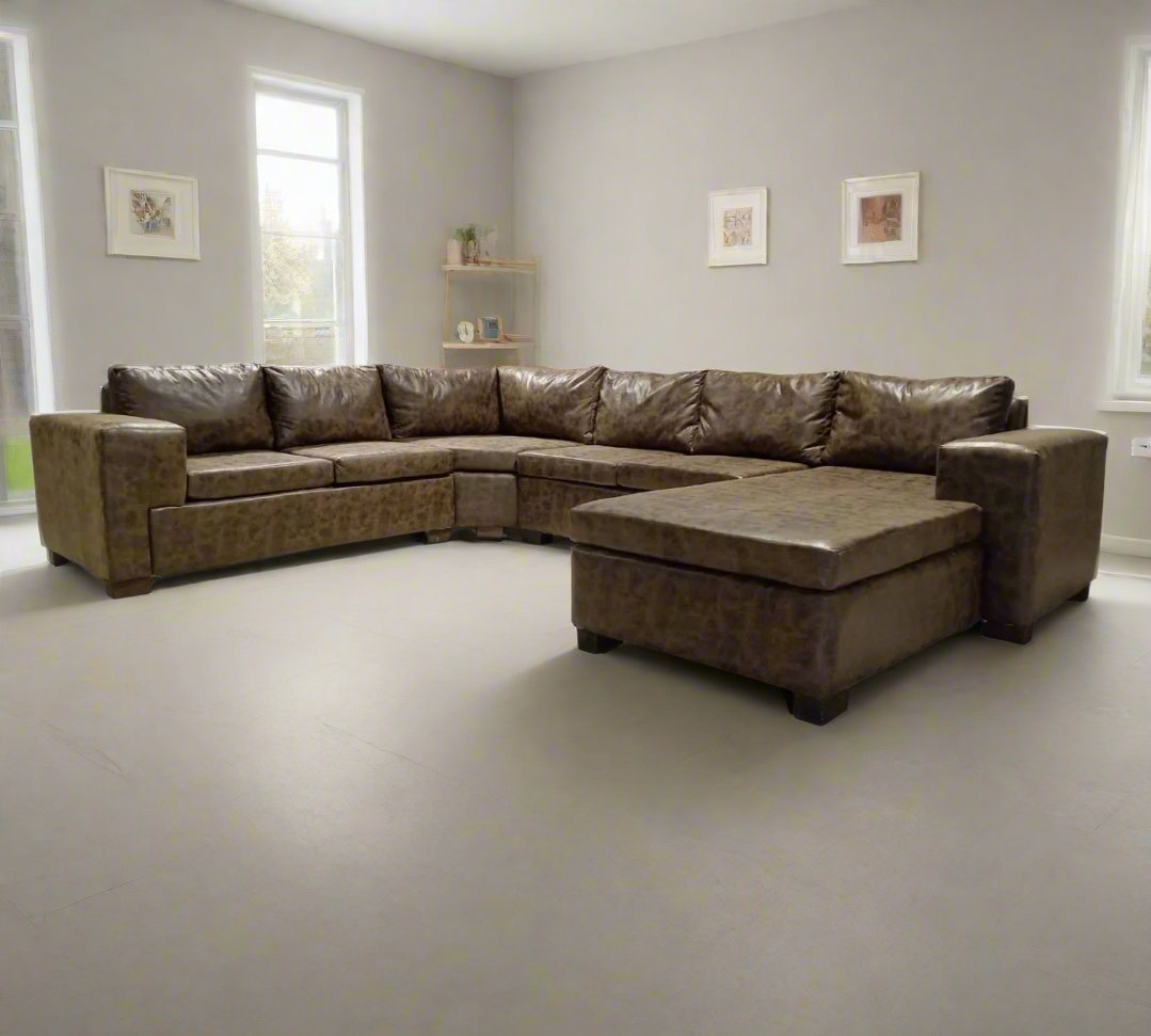 Large Brown Corner Lounge Suite in a living room - That Couch Place