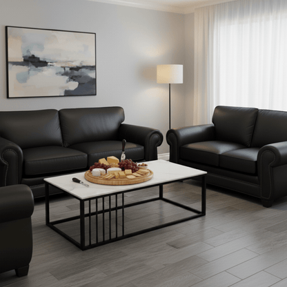 Marble coffee table with steel base in living room with soft black leather couches- That Couch Place