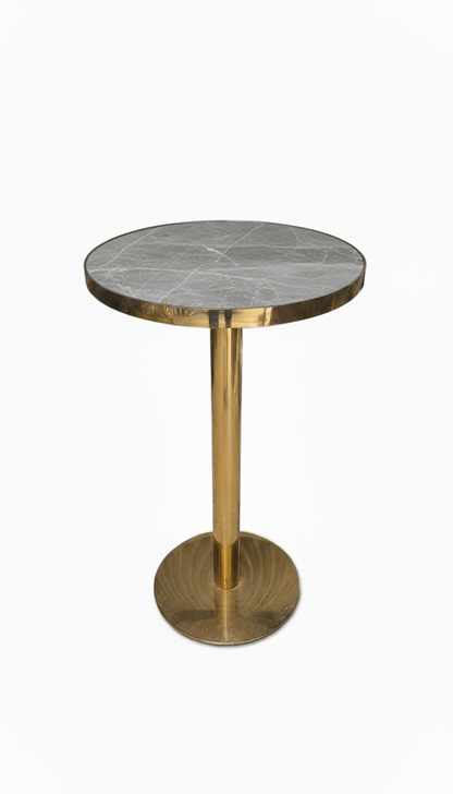 Small round table with marble top and gold base on a white background. That Couch place