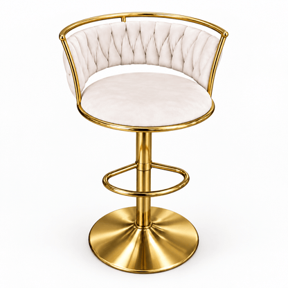 A modern swivel bar stool with a tufted cream velvet seat and backrest, supported by a polished gold-finished metal frame and circular pedestal base.