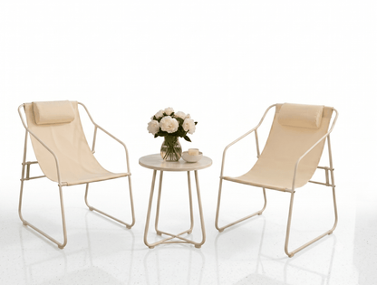 Two beige chairs with a small round table featuring a vase of flowers on a white background