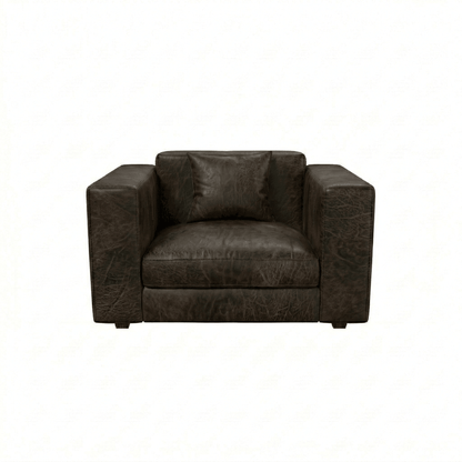 Brown leather armchair on a white background