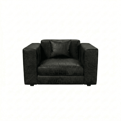 Black leather armchair on a white background