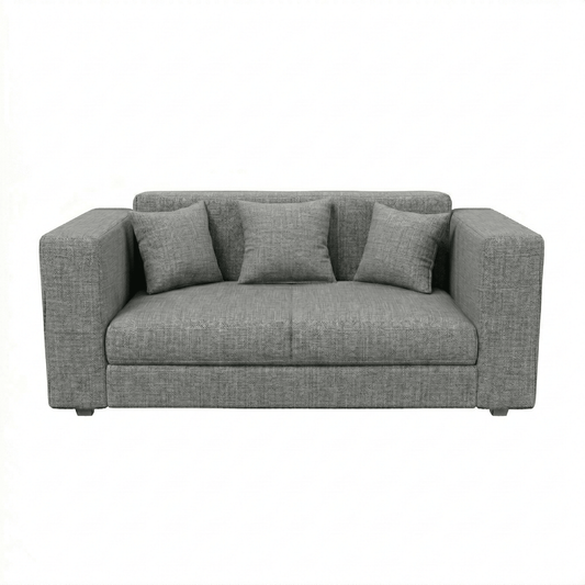 Gray sofa with three cushions on a white background