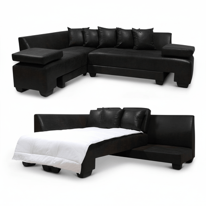 Black sectional sofa with a bed extension on a white background-That Couch Place