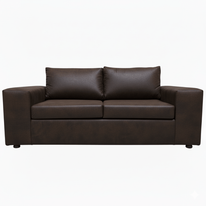Brown leather two seater oversized couch sofa on a white background. The Couch Place