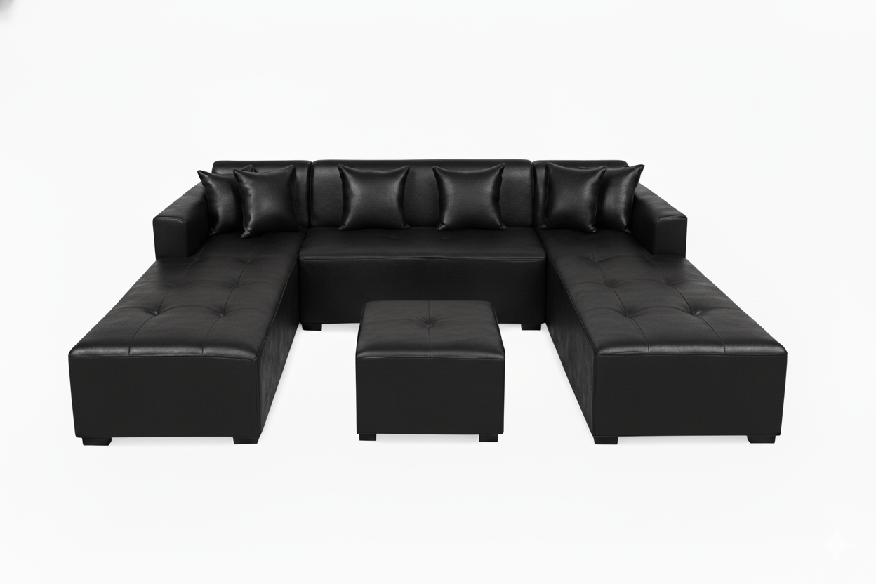 Black leather U shape couch sectional sofa with ottoman on a white background The Couch Place