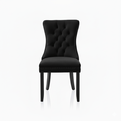 Black upholstered dining chair on a white background