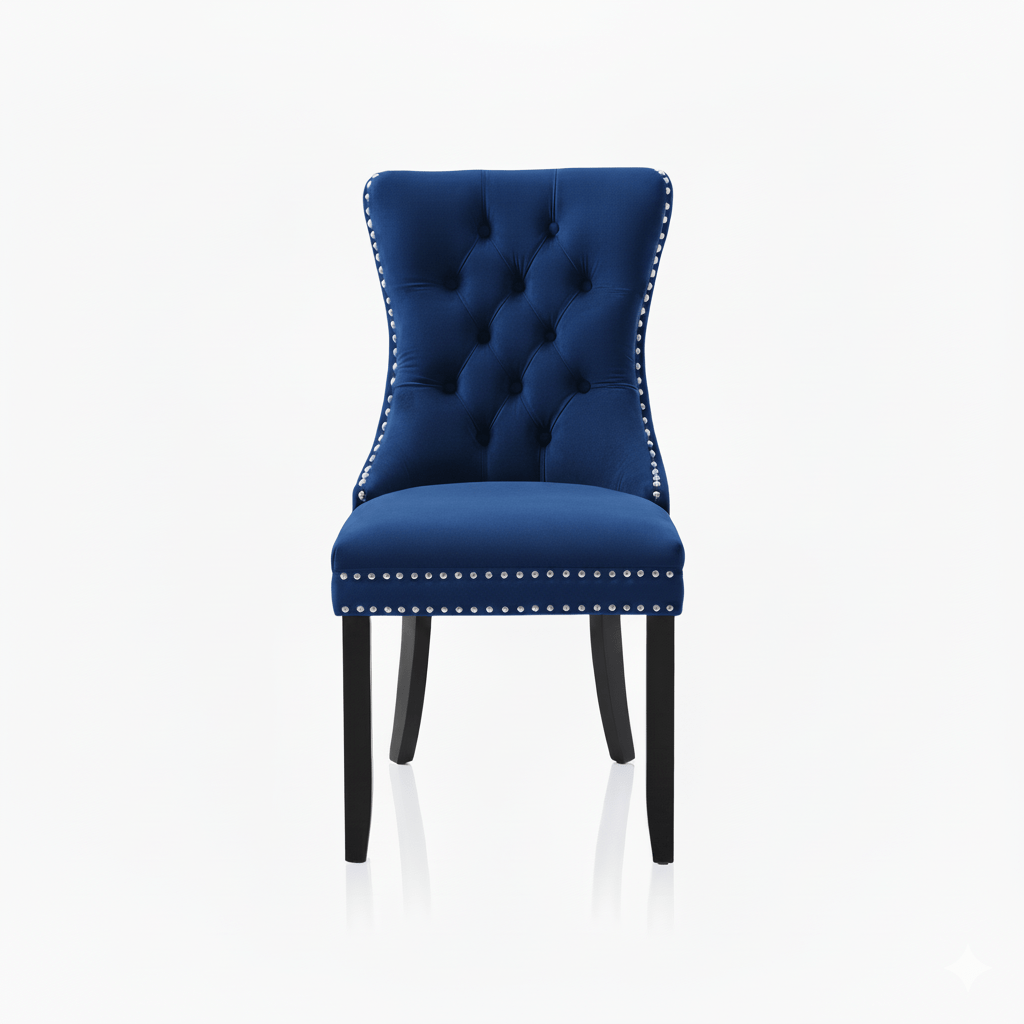 Blue tufted chair with silver studded details on a white background