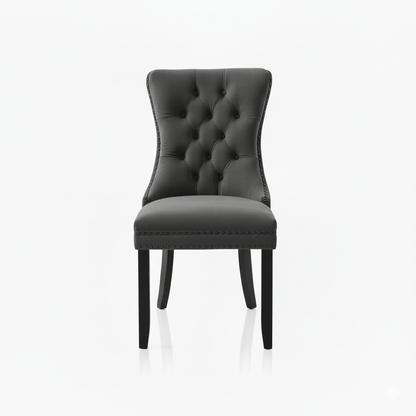 Gray tufted dining chair on a white background
