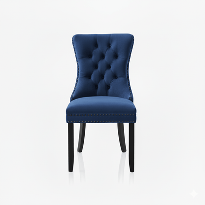 Blue upholstered chair with tufted backrest on a white background
