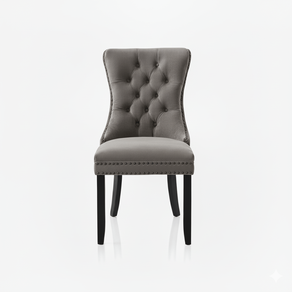 Gray upholstered chair with buttoned backrest on a white background