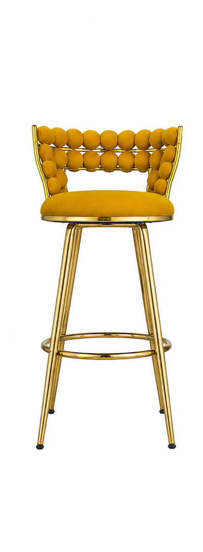 A modern bar stool with a mustard yellow tufted seat and backrest, supported by a polished gold metal frame with a footrest.