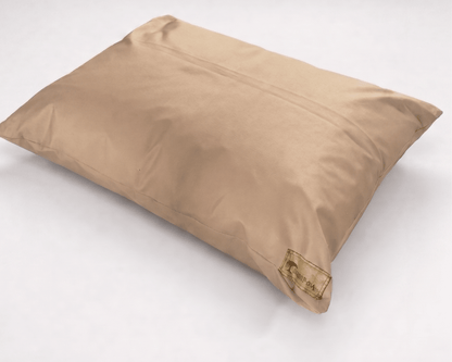light brown pillow on a white background