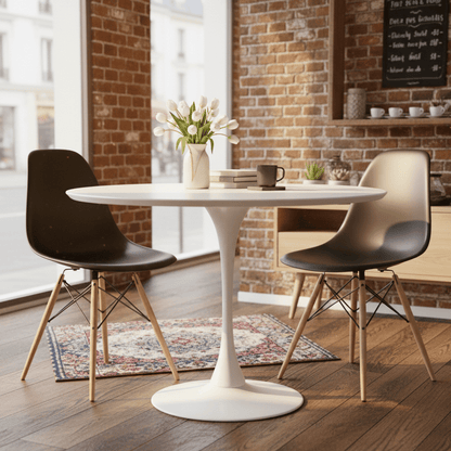 Dining Chair - 2 Black Emma chairs at a tulip table in a bistro setting - That Couch Place