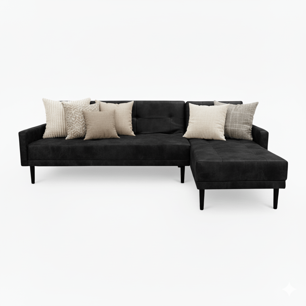 Black sectional sofa with decorative pillows on a white background That Couch Place